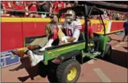  ?? CHARLIE RIEDEL - THE ASSOCIATED PRESS ?? FILE - In this Sept. 23, 2018 file photo, San Francisco 49ers quarterbac­k Jimmy Garoppolo (10) is carted off the field after being injured during the second half of an NFL football game against the Kansas City Chiefs, in Kansas City, Mo.