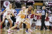  ?? DARRON CUMMINGS — THE ASSOCIATED PRESS ?? Indiana’s Grace Berger, left, makes a steal against Tennessee Tech’s Anna Walker during the first half of a first-round college basketball game in the women’s NCAA Tournament Saturday, March 18, 2023, in Bloomingto­n, Ind.