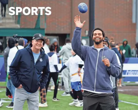  ?? ERIC SEALS/DETROIT FREE PRESS ?? NFL commission­er Roger Goodell watches USC quarterbac­k Caleb Williams, who is expected to be the first pick in this year's NFL draft, catch the football while throwing to Detroit-area Special Olympics athletes on Wednesdar.