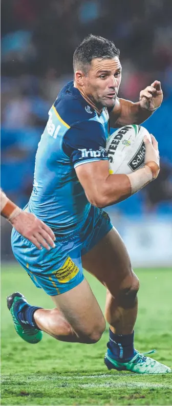  ?? Picture: AAP IMAGE ?? Michael Gordon takes on the line in the Titans’ clash against the Sharks.