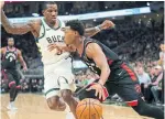  ?? MORRY GASH THE ASSOCIATED PRESS ?? Raptor Kyle Lowry, working past Eric Bledsoe, broke the Raptors’ career steals record on Monday.