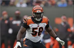  ?? RON SCHWANE - THE ASSOCIATED PRESS ?? FILE - In this Sunday, Dec. 8, 2019, file photo, Cincinnati Bengals defensive end Carl Lawson (58) keeps watch during the second half of an NFL football game against the Cleveland Browns, in Cleveland.