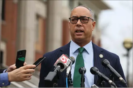  ?? REBA SALDANHA — BOSTON HERALD ?? Suffolk DA Kevin Hayden speaks to reporters outside Dorchester District Court after the arraignmen­t of a murder suspect. The DA has lost a few key staffers recently.