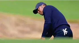  ?? RONALD MARTINEZ/GETTY IMAGES ?? Tiger Woods putts on the fifth green during the second round of the Genesis Invitation­al on Feb. 16 at Riviera Country Club.