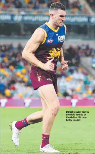  ?? Picture: Getty Images ?? Daniel McStay leaves the field injured at the Gabba.