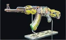  ?? Grey Space Art ?? “MOTHER NATURE’S GUN,” by Robert Mickelsen and Calvin Mickle, is among the pieces in the pop-up art-glass showcase.