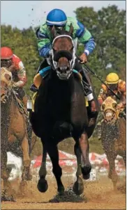  ?? PROVIDED BY SPENCER TULIS ?? By the Moon takes home the win in the Ballerina by a head with Rajiv Maragh getting the ride. Winning the Ballernia gives By the Moon her second Grade 1 win since the Frizette Stakes in her two-year-old campaign at Belmont.