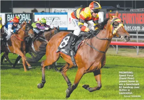  ?? Picture: TASRACING ?? PROMISING: Speed Force (David Pires) powers home to
win a benchmark 82 handicap over 1620m in Launceston.