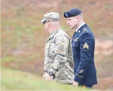  ?? SARA D. DAVIS, GETTY IMAGES ?? U.S. Army Sgt. Bowe Bergdahl is escorted into the military courthouse for his sentencing hearing.