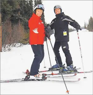  ?? KYLE TAYLOR PHOTO ?? Olympic champion Nancy Greene gives writer Steve MacNaull a few tips before they race on the new ski and snowboard cross course at Sun Peaks Resort near Kamloops, British Columbia.