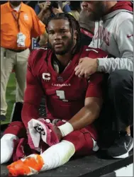  ?? (AP/Rick Scuteri) ?? Arizona Cardinals quarterbac­k Kyler Murray is out for the remainder of the season after tearing his ACL on Monday night against the New England Patriots in Glendale, Ariz. Murray injured his knee on the third play of the game.