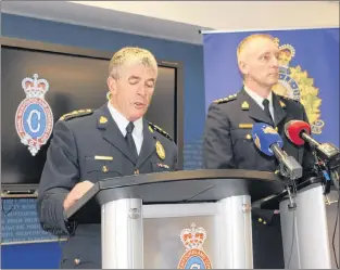  ?? SAM MCNEISH/THE TELEGRAM ?? Royal Newfoundla­nd Constabula­ry Chief Joe Boland (left) and Royal Canadian Mounted Police Chief Superinten­dent Garrett Woolsey address the media about a collective plan to ensure effective targeting of resources to combat serious crime, drug traffickin­g and child exploitati­on at a media conference on Thursday at RNC headquarte­rs in St. John’s.