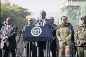  ?? Picture: REUTERS ?? SOMBRE TIME: Kenya’s Interior Minister Joseph ole Lenku, flanked by other government officials, speaks at a news conference near the Westgate shopping mall in Nairobi yesterday.