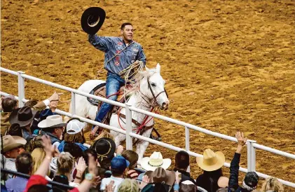  ?? Marvin Pfeiffer/Staff photograph­er ?? Shad Mayfield takes a victory lap after winning a competitio­n one night last week at the San Antonio Stock Show & Rodeo.