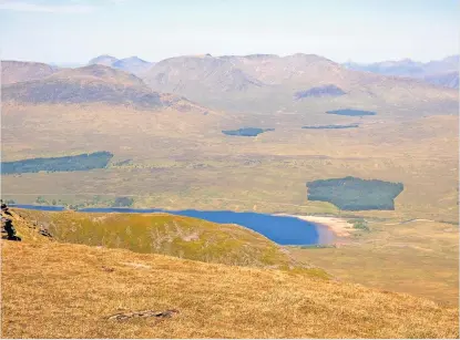  ?? ?? Stunning view Looking down to Loch Tulla from the summit of Beinn an Dothaidh, by Davie Macdonald