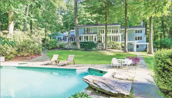  ?? Coldwell Banker Realty / Contribute­d photos ?? This 5,712- square- foot home offers an inground gunite pool and spa, plus a legal accessory apartment on the lower level for in- laws, au pair or guests.