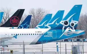  ?? PAUL CHIASSON THE CANADIAN PRESS FILE PHOTO ?? Air Canada’s decision not to extend the transactio­n date of a deal with Transat comes as the airline industry suffers from a lack of travel demand during the COVID-19 pandemic.
