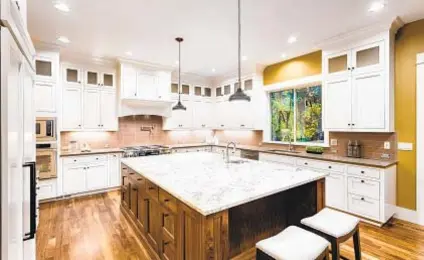  ?? GETTY IMAGES ?? Quartz countertop­s are safe once installed, but before installati­on check with your contractor about what safety measures they use to prevent harmful silica dust exposure.