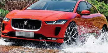  ??  ?? Making a splash: The all-electric I-Pace can handle some tough conditions