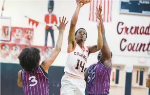  ?? STEPHEN M. DOWELL/ORLANDO SENTINEL ?? Colonial senior Dominic Sanders (14), shown in a regular-season win against Timber Creek, scored 36 points in Friday’s Class 7A Region 1 victory against Evans.