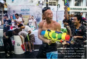  ??  ?? Songkran, the Thai “water pouring festival,” coincides with one of Bangkok’s largest gay parties of the year