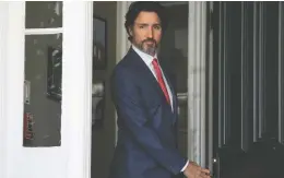  ?? JUSTIN TANG / THE CANADIAN PRESS ?? Prime Minister Justin Trudeau appears outside Rideau Cottage, his residence in Ottawa, on Tuesday for his daily news conference on the COVID-19 pandemic.