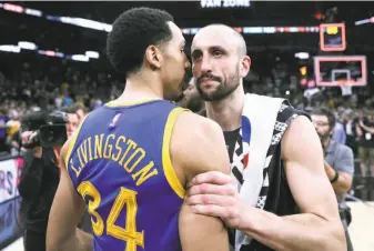  ?? Scott Strazzante / The Chronicle ?? Shaun Livingston greets Manu Ginobili after the Warriors defeated the Spurs 129-115 in Game 4 of the Western Conference finals. It might have been the final NBA appearance for Ginobili, 39.