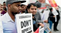  ??  ?? Indian students protest their possible deportatio­n after their visa agent in Hyderabad filed fraudulent documents without their knowledge.