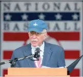  ?? AP FILES ?? Roger Angell speaks after receiving the J.G. Taylor Spink Award during a ceremony in 2014 at the Baseball Hall of Fame in Cooperstow­n, N.Y.