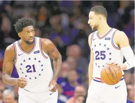  ?? TIM TAI/THE PHILADELPH­IA INQUIRER/TNS ?? The Philadelph­ia 76ers’ Joel Embiid, left, and Ben Simmons should be healthy if the NBA season resumes. Both were battling injuries before the shutdown.