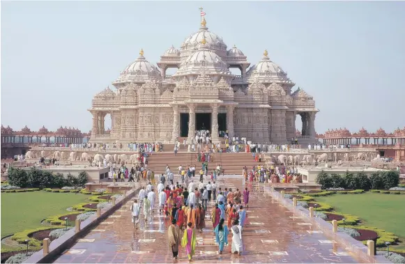  ?? Getty ?? Temples such as the Akshardham shrine in New Delhi are the inspiratio­n behind the Abu Dhabi temple planned to be built by 2020