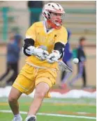  ?? LLOYD FOX/BALTIMORE SUN ?? Senior attackman Jacob Kelly is trying to help Calvert Hall become the first team to repeat as MIAA A champ since 2009.