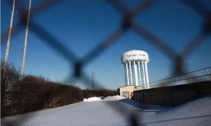  ?? Photograph: Geoff Robins/AFP/ Getty Images ?? More than half of Flint’s 81,000 residents have signed up for a share of the newly-announced settlement.