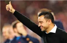  ?? — AFP photo ?? Xavi gestures after a La Liga match between FC Barcelona and Real Sociedad at the Camp Nou stadium in Barcelona.