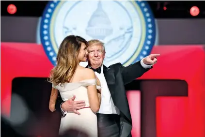  ??  ?? BALLROOM BLITZ: Donald and Melania Trump dance at the Freedom Ball on January 20 in Washington, D.C.