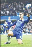  ??  ?? Chelsea’s Belgian midfielder Eden Hazard celebrates after scoring their third goal during the English Premier League football match between Chelsea and Manchester United at Stamford Bridge
in London on Oct 23. (AFP)