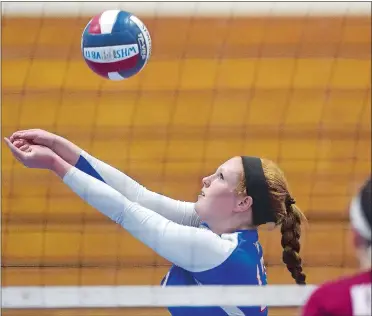  ?? DANA JENSEN/THE DAY ?? Waterford’s Olivia Pacheco passes the ball to a teammate during Monday night’s 3-0 loss to Killingly in an earlyseaso­n matchup of Eastern Connecticu­t Conference Division II volleyball unbeatens. Pacheco finished with seven kills and three blocks for...