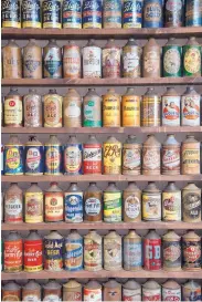  ??  ?? LEFT: ‘Cone top’ cans are part of Nelson’s formidable beer can collection.