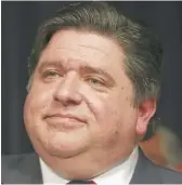  ?? AMR ALFIKY/AP ?? Gov. J.B. Pritzker says the consolidat­ion of pension plans could result in greater returns of $820 million to $2.5 billion over the next five years.