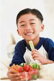  ??  ?? Teach children that vegetables can be tasty too. — AFP