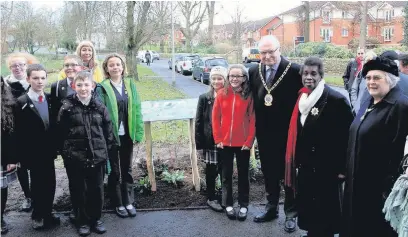  ??  ?? ●● Mayor of Cheshire East Councillor Wesley Fitzgerald at the opening of the sanctuary, with schoolchil­dren, Coun Alift Harewood and Coun Carolyn Andrew