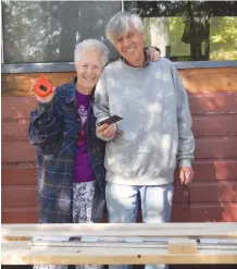  ??  ?? The siblings at work on their cottage—and their family traditions