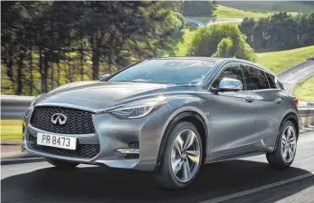  ?? FOTO: INFINITI ?? Dynamische­s, edles Design: Der Q30 soll den japanische­n Autobauer Infiniti ins Blickfeld rücken.