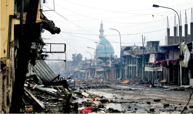  ?? AFP ?? A general view show a destroyed street as the Iraqi counter-terrorism service advance towards the Yabasat neighbourh­ood during their ongoing offensive to push Daesh out of Mosul. —