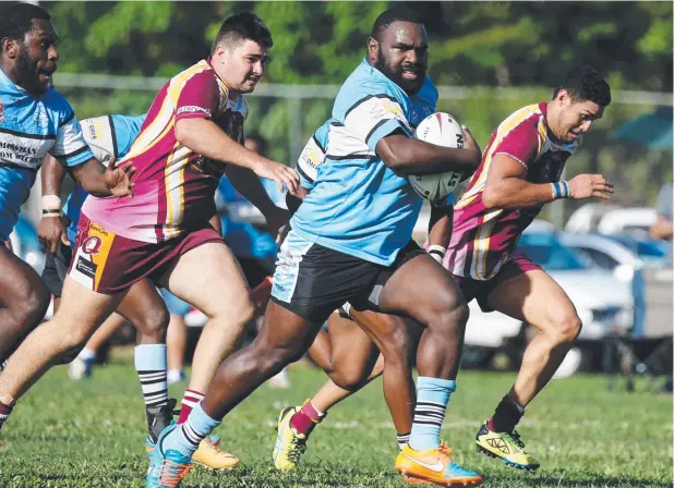  ?? Picture: STEWART McLEAN ?? ALL POWER: Mossman's Bert Whap doing what he does best in the CDRL for Mossman – barging rivals out of the way.