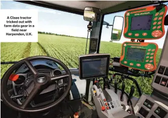  ??  ?? A Claas tractor tricked out with farm data gear in a field near Harpenden, U.K.