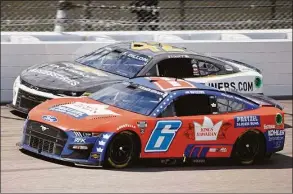  ?? Colin E. Braley / Associated Press ?? Ty Dillon and Brad Keselowski (6) come out of Turn 4 side-by-side during a NASCAR Cup Series race May 15 at Kansas Speedway in Kansas City, Kan.