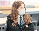  ?? ?? COVER-UP Pupils must stay masked