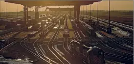  ??  ?? Freight is offloaded at a BNSF Railway facility in Edgerton, Kan., in 2019. Railroads are accused of illegally raising freight fees.