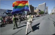  ?? RICK BOWMER — THE ASSOCIATED PRESS FILE ?? In this file photo, a group of Boy Scouts march during the Salt Lake City’s annual gay pride parade in Salt Lake City.